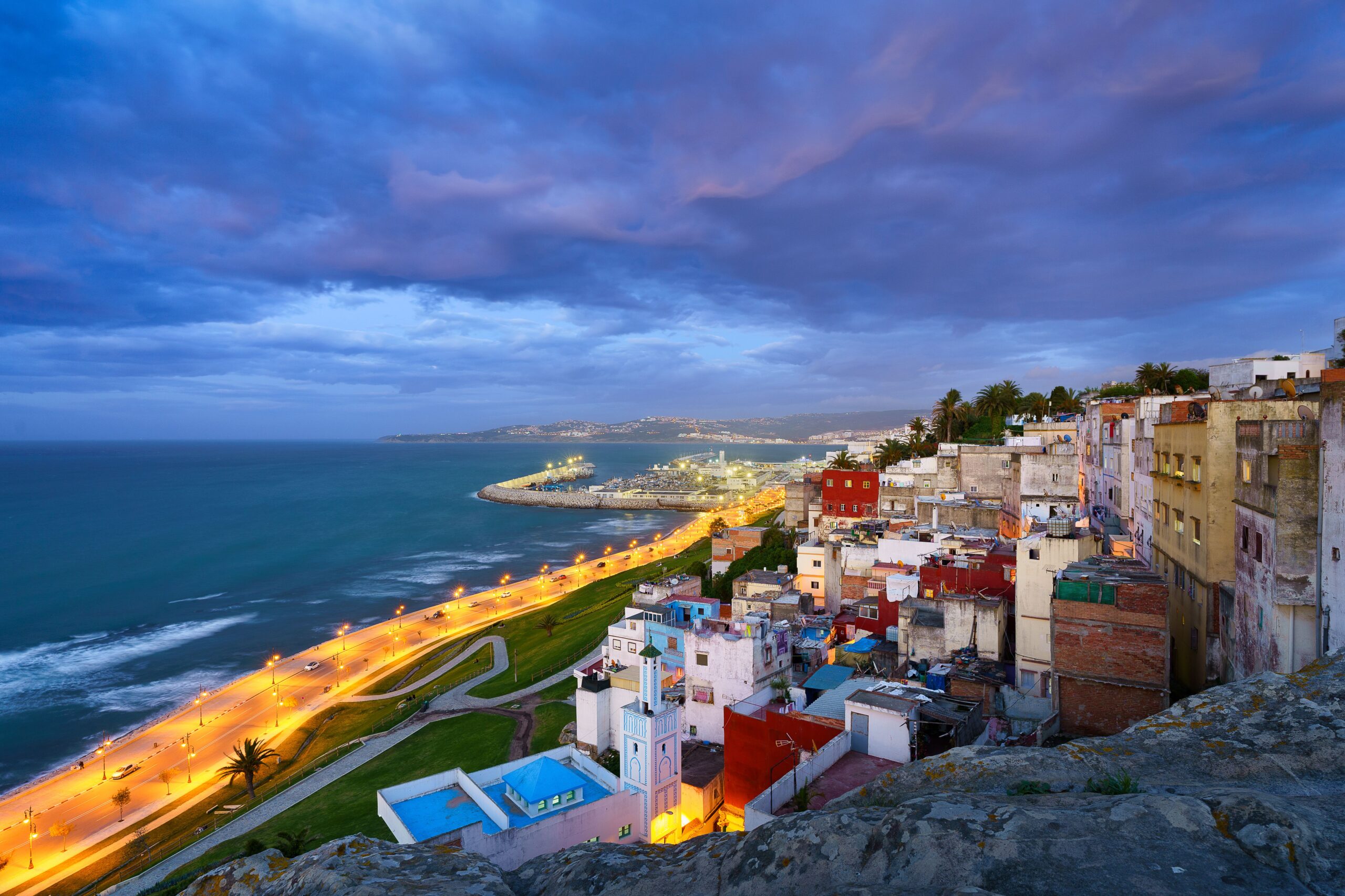 An aerial view of cityscape Tangier surrounded by buildings and water